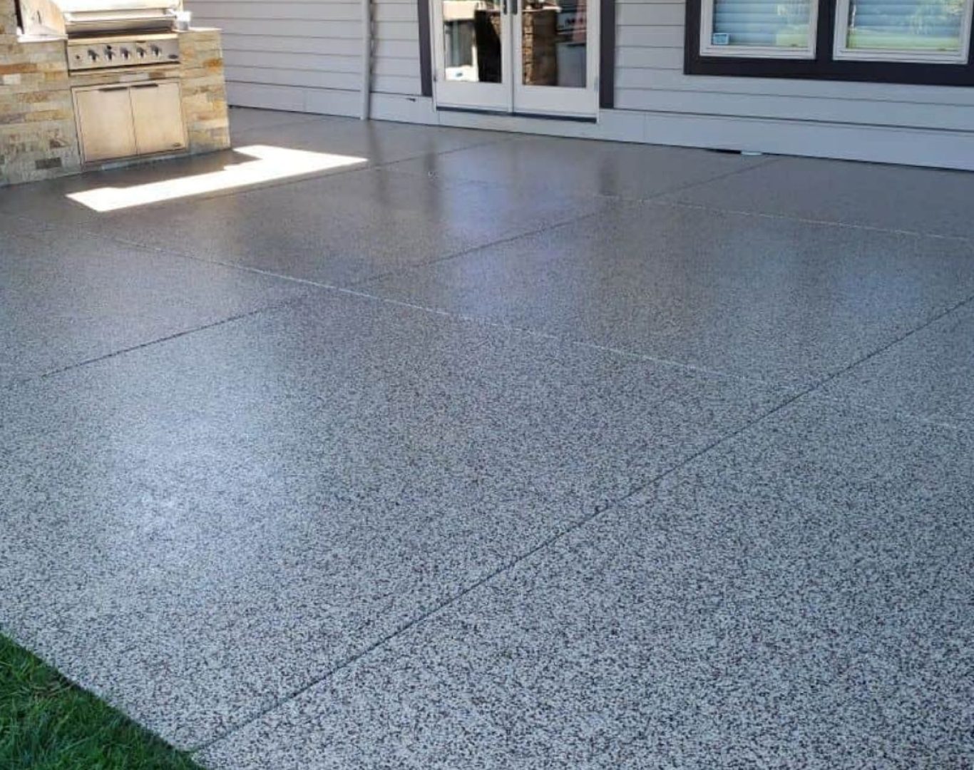 Colorful Concrete Solutions team installs concrete coatings in Washington County, WI, delivering durable results with pro tools.